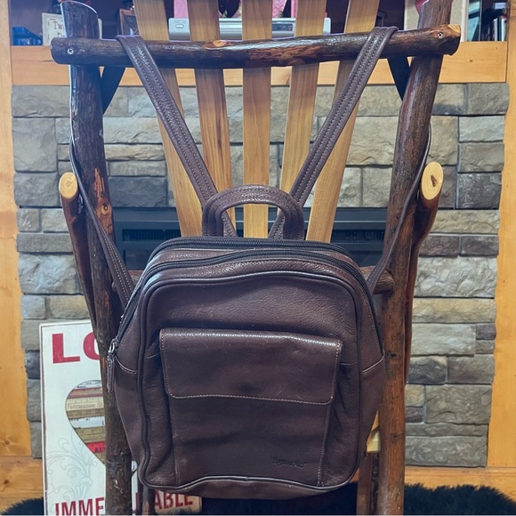 Tignanello Handbags - Tignanello Brown Leather Backpack with Multiple Compartments